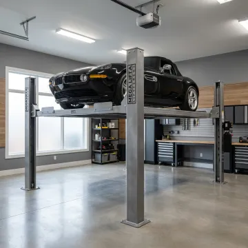 Vehicle raised on a custom car lift in a garage