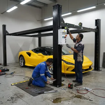 Technicians installing a custom car lift system