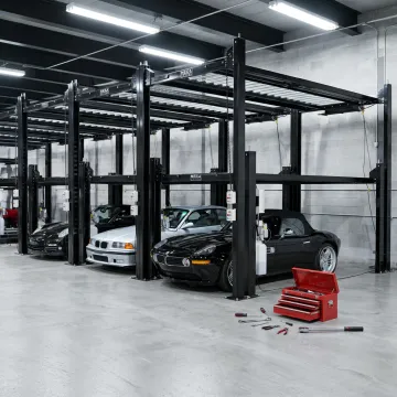 Four-post car lift in a modern garage