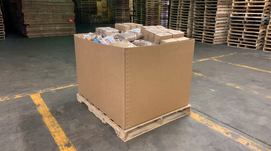 Gaylord bulk container box stacked on warehouse pallet for shipping