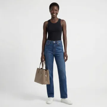 AI-generated fashion model wearing contemporary apparel in professional studio setting