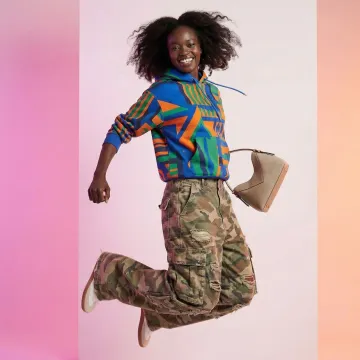 AI-generated fashion model in trendy outfit posing for social media video content