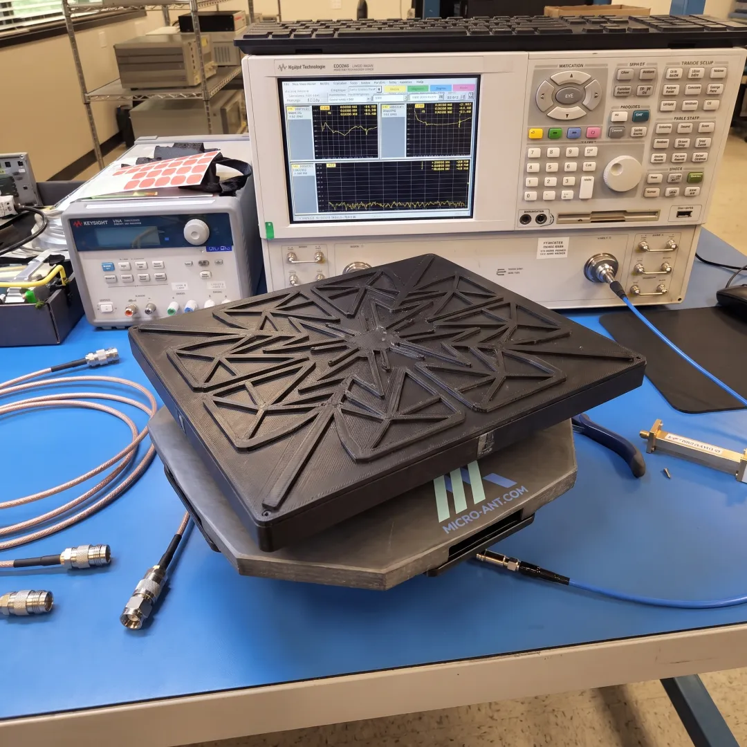 Ka-band flat panel antenna prototype on an engineering workbench