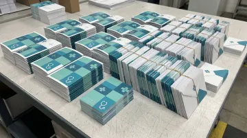 Healthcare direct mail campaign postcards sorted and ready for delivery