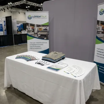 Custom branded pens and promotional items for a trade show booth