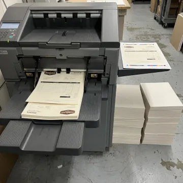 Printer producing custom business forms