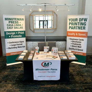 Custom trade show banner display at an event booth