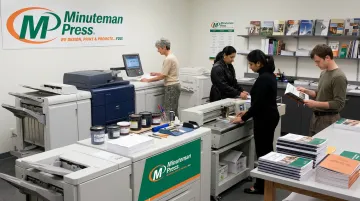 Minuteman Press production team handling booklet printing and binding in-house