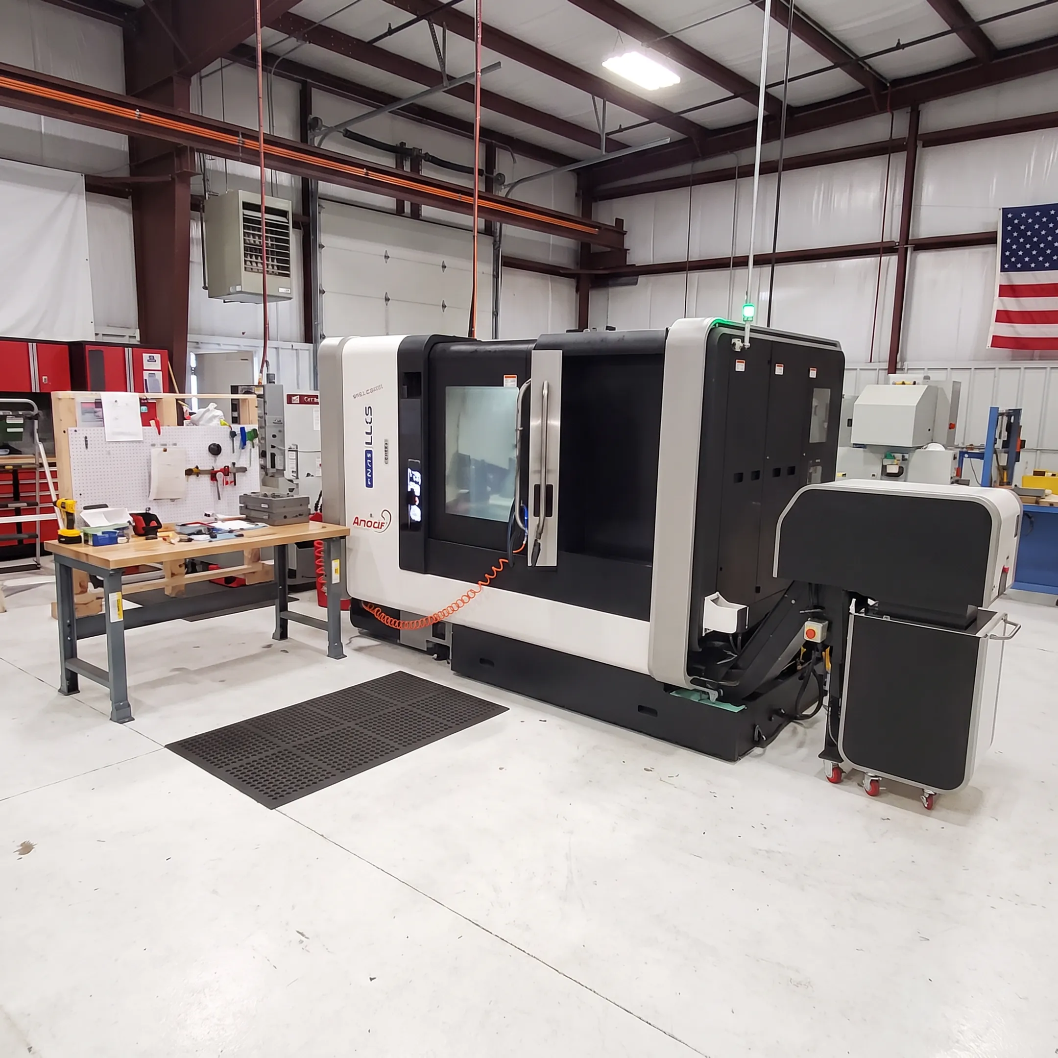 Precision orthopedic component beside machining and inspection equipment