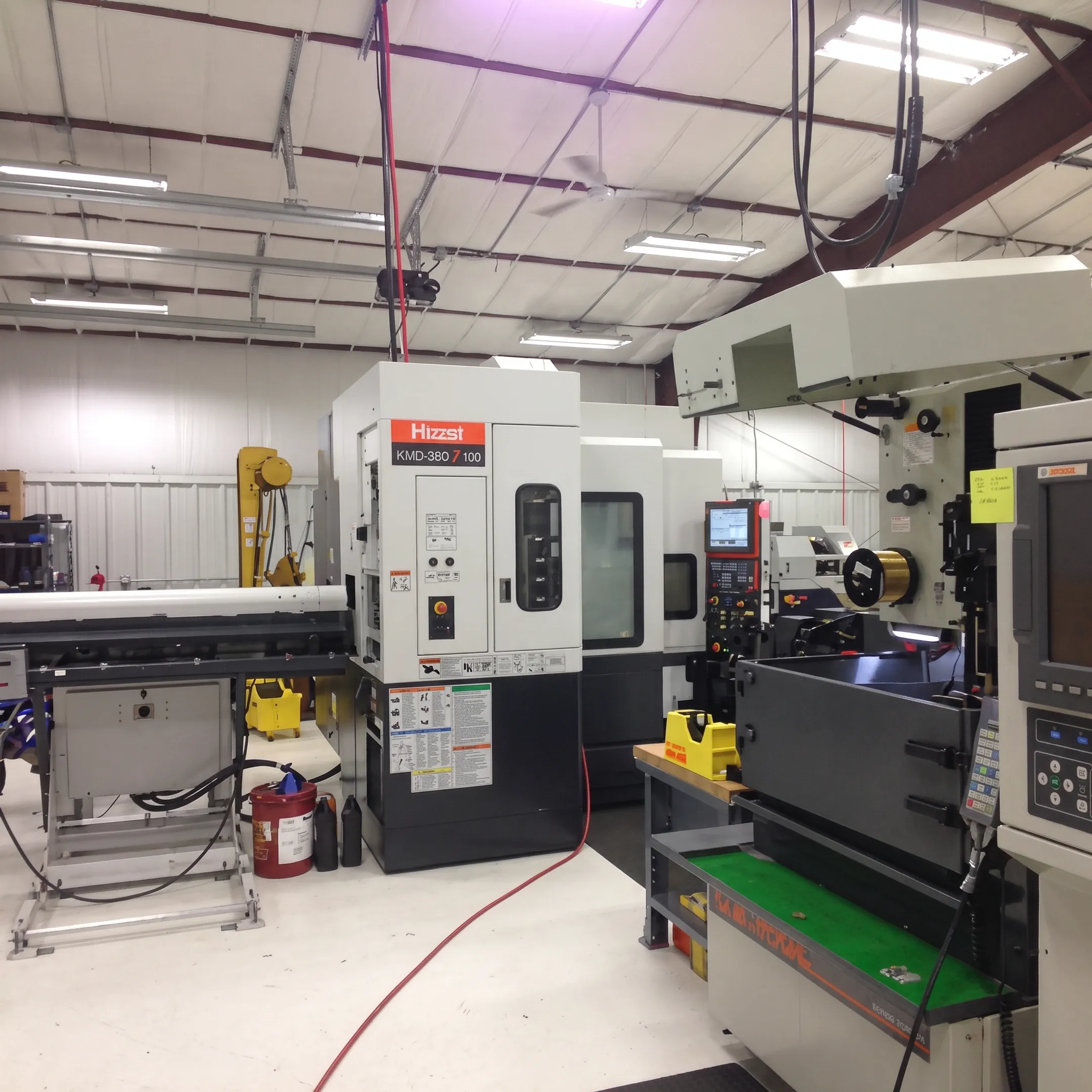 Orthopedic implant components and precision machining tools arranged for manufacturing review