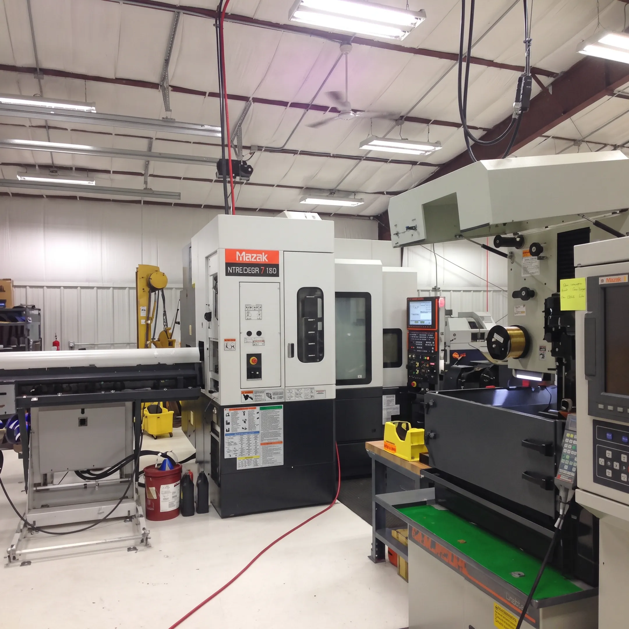 Engineer reviewing precision facet screw system components during manufacturing planning