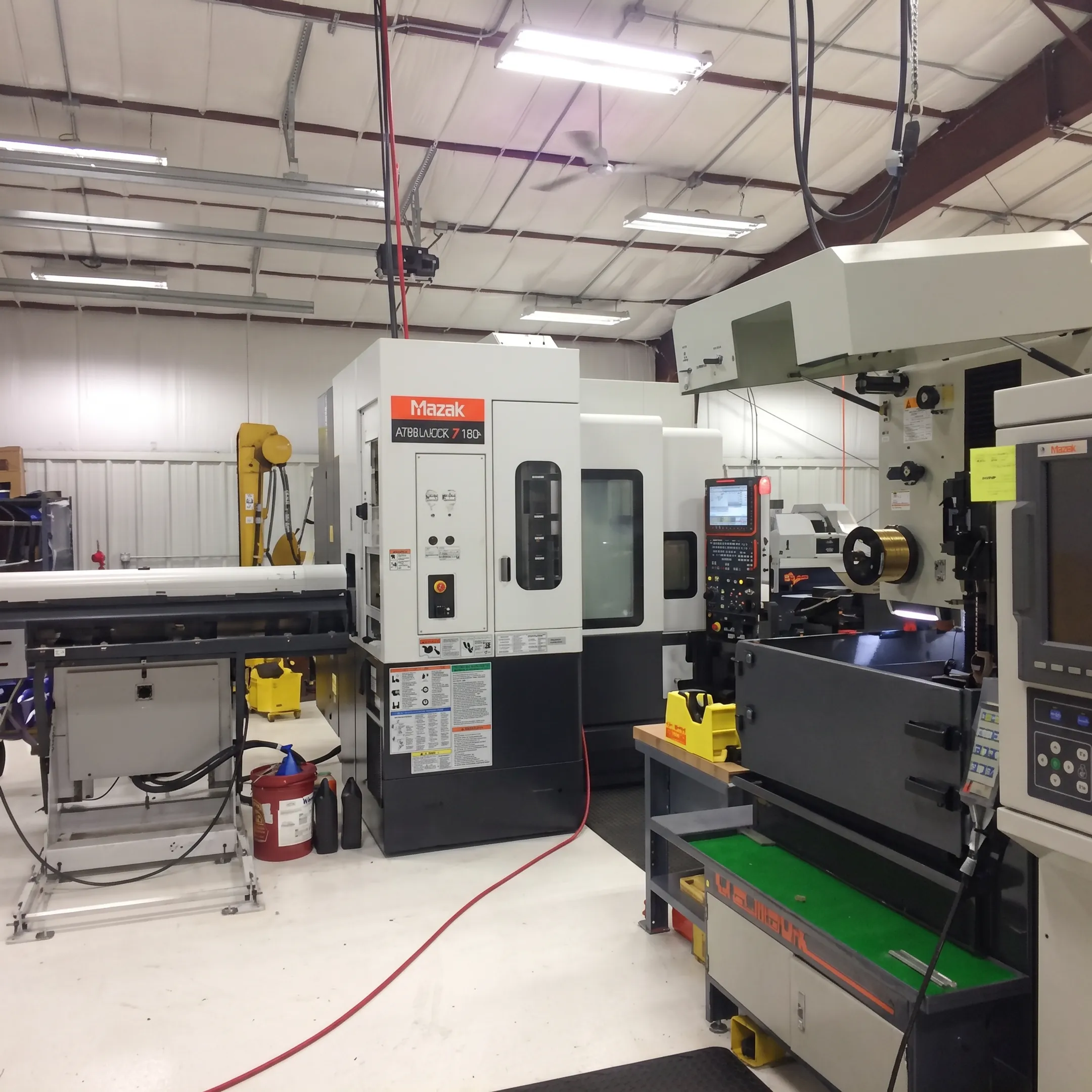 Orthopedic component prototype and precision machined parts displayed in a manufacturing workspace