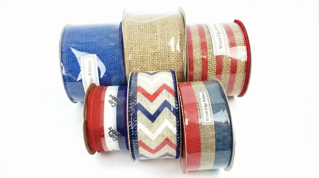 Decorative patriotic wired edge ribbon spools in red white and blue colorways