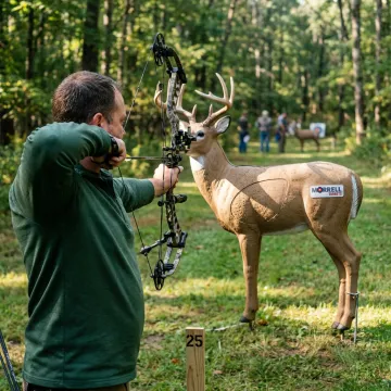 Competitive archery tournament with 3D deer target