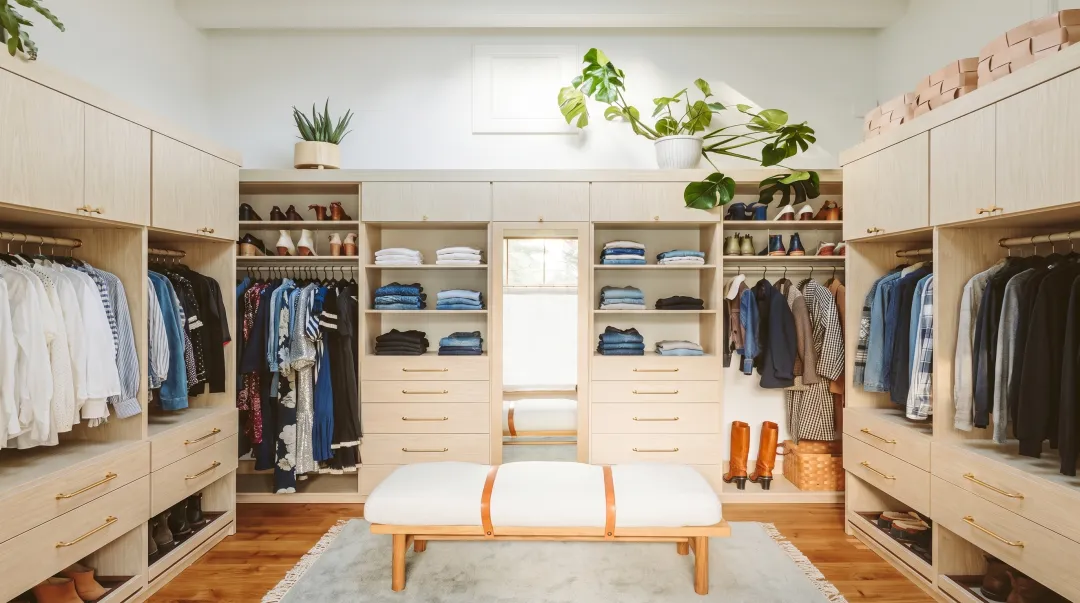 Organized closet at 50 percent capacity showing spacious storage with visible shelf space