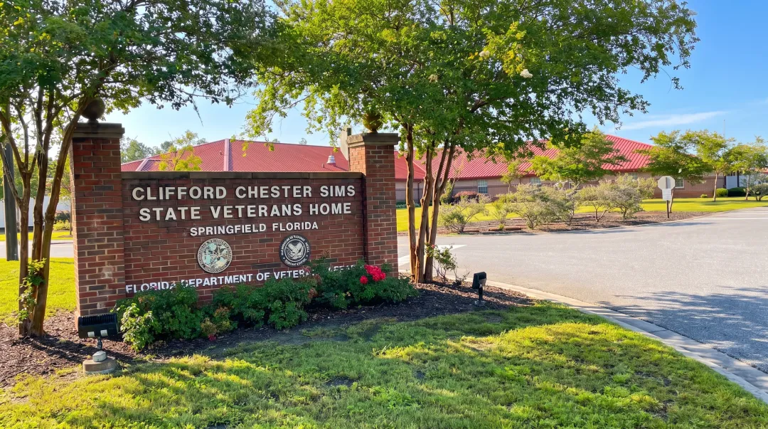 Florida State Veterans Home exterior showing the entrance and landscaping