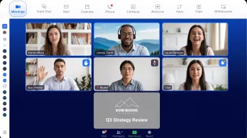 Remote team video conference meeting with collaboration tools visible on multiple screens