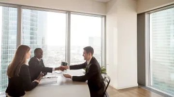 HR advisor reviewing workforce strategy with small business leadership