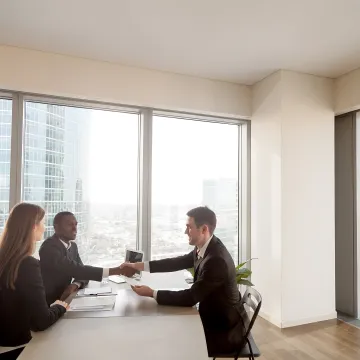 HR consultant meeting with business leaders