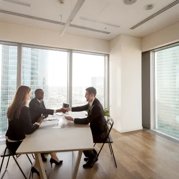 HR consultant facilitating a workplace conflict discussion
