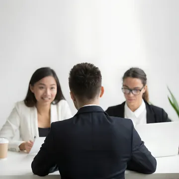 Facilitator leading a workplace team development session