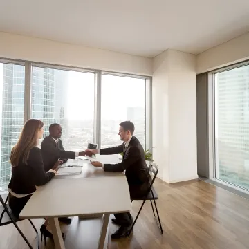 HR consultant meeting with business leaders