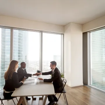 HR consultant meeting with business leaders
