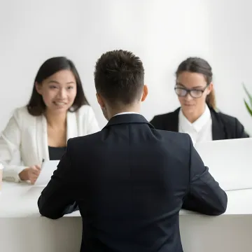 HR advisor reviewing workplace policies with business leaders