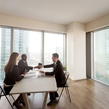 HR consultant leading an executive strategy meeting