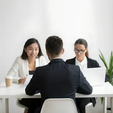 HR advisor reviewing a workforce strategy with leaders