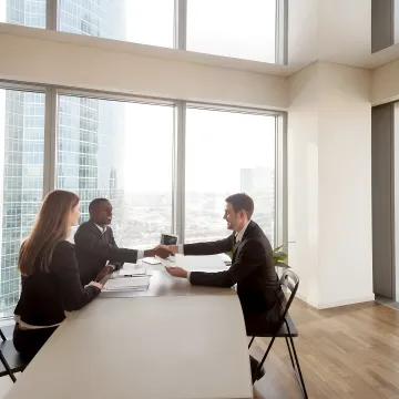 HR consultant meeting with business leaders