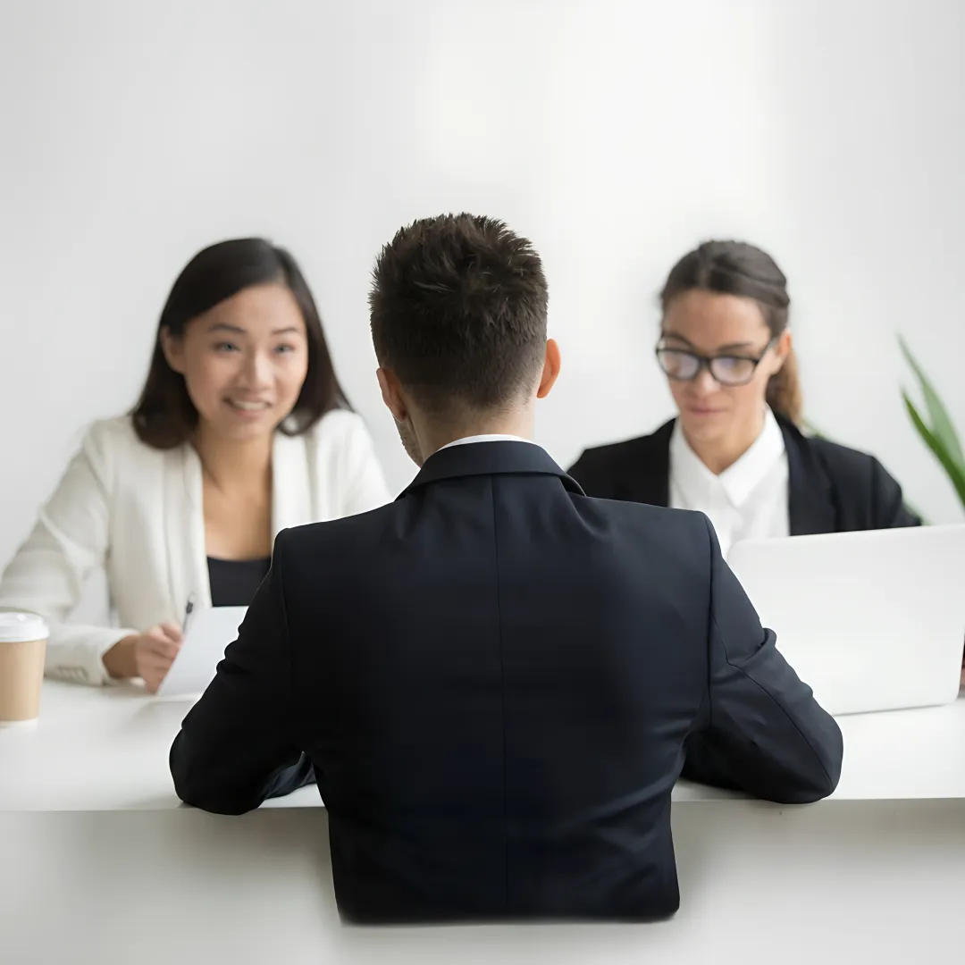 Business leaders discussing employee compensation