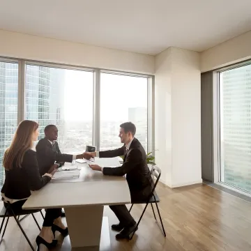 HR consultant leading a workplace compliance training session
