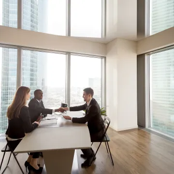 HR consultant meeting with business leaders