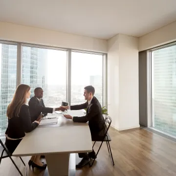 HR consultant facilitating a workplace conflict discussion
