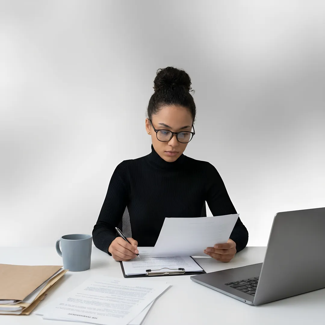 HR professional reviewing workplace investigation documents