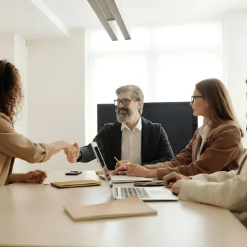HR consultant meeting with business leaders
