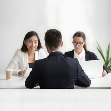 Managers practicing communication skills in a workshop