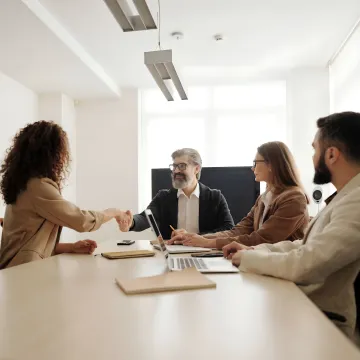 Employees collaborating during culture training