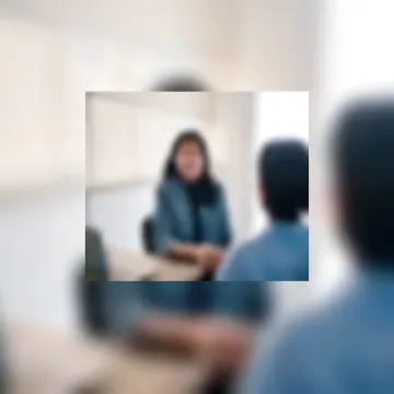 HR consultant reviewing healthcare employee policies