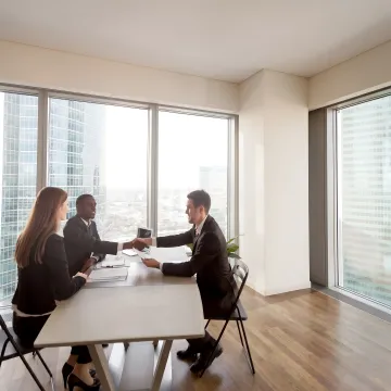 HR professional reviewing compliance documents