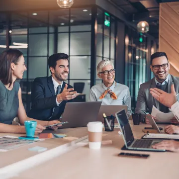 Business leaders collaborating in a workplace meeting