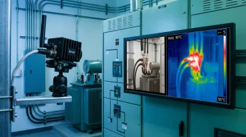 Fixed thermal imaging camera monitoring electrical panel hotspots in industrial facility