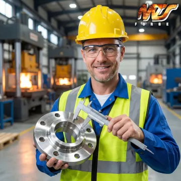 MTS Forge technician inspecting stainless steel forged fittings for dimensional accuracy