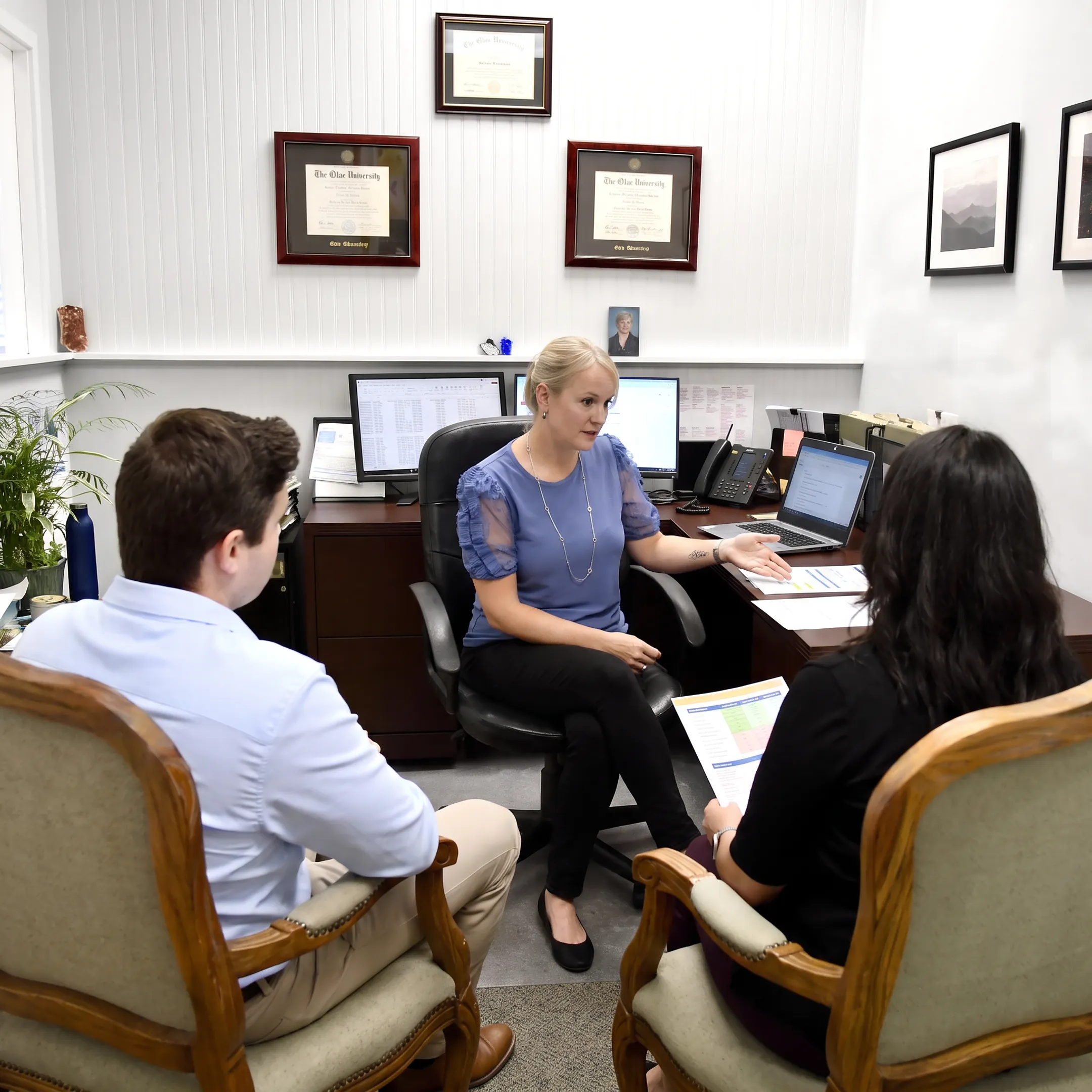 Benefits adviser explaining coverage choices