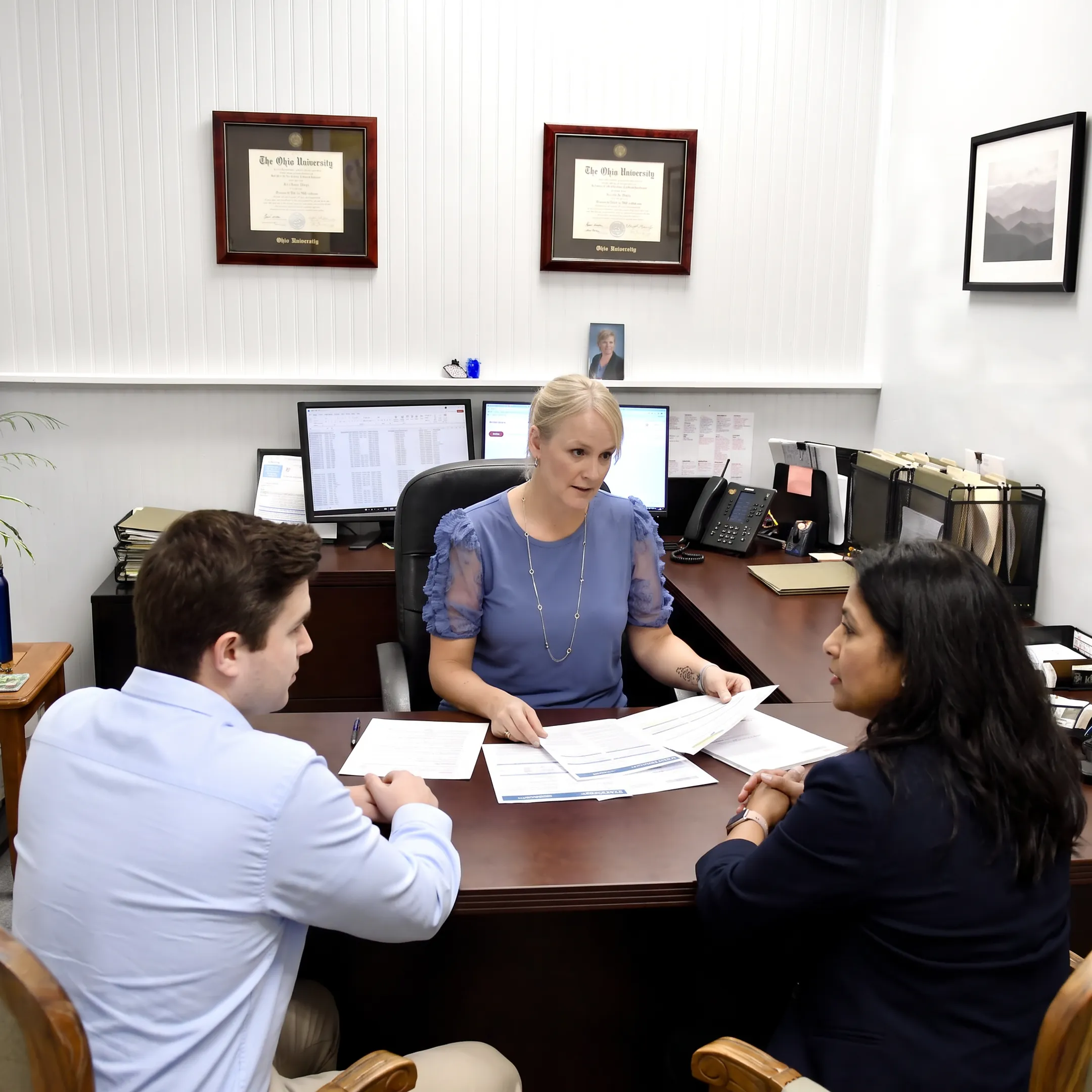 Benefits adviser meeting with employer team