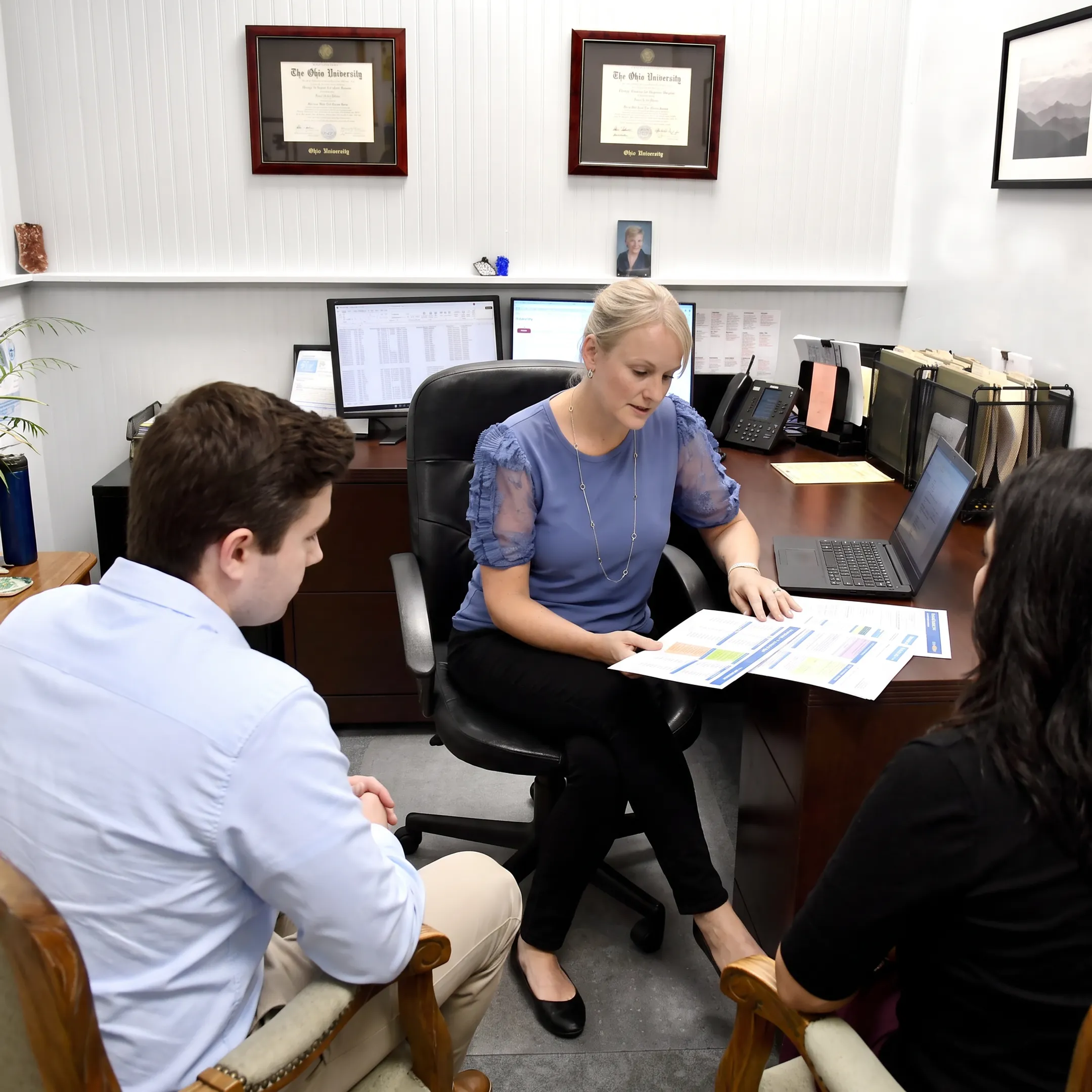 Client comparing health insurance plans with an agent