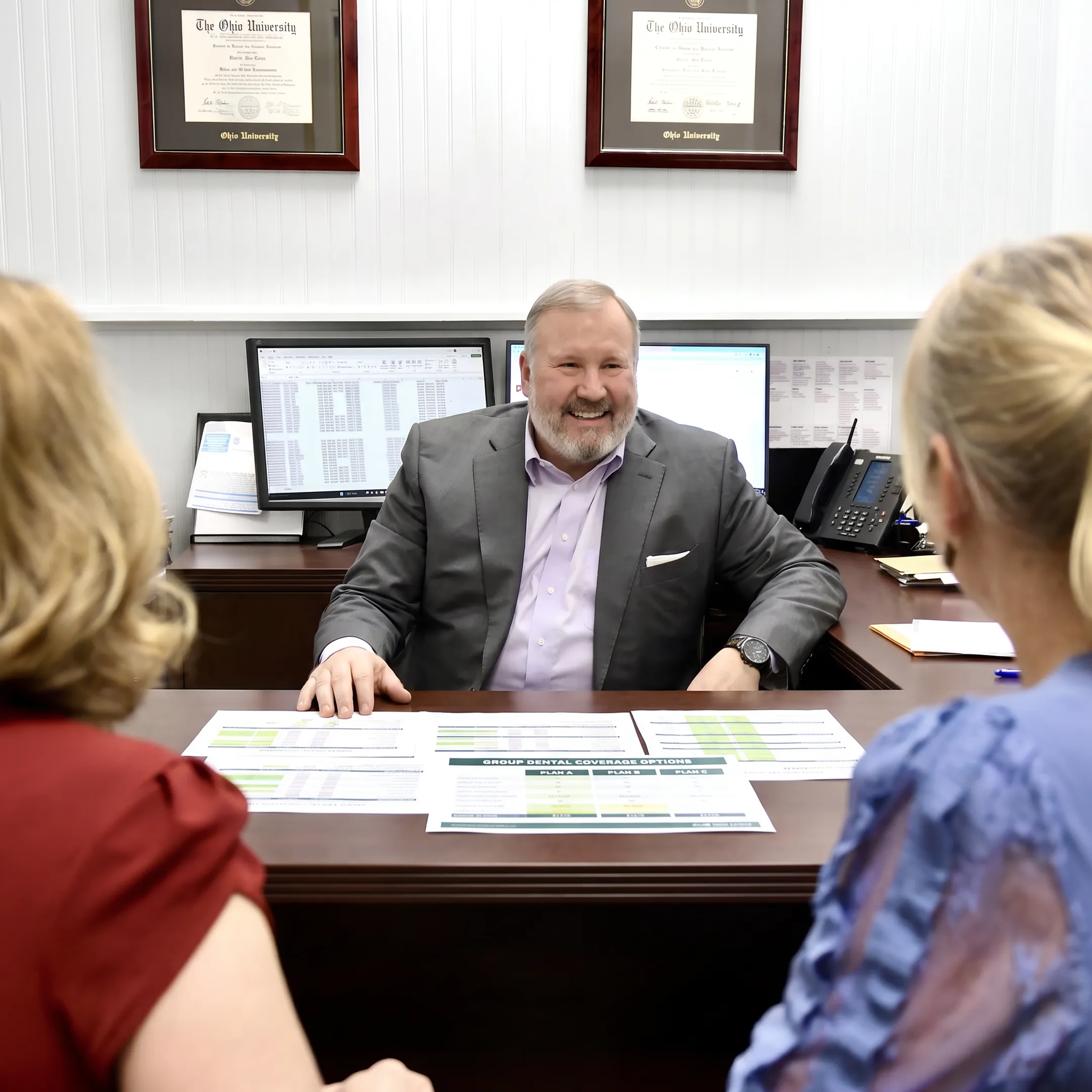 Benefits adviser explaining dental coverage