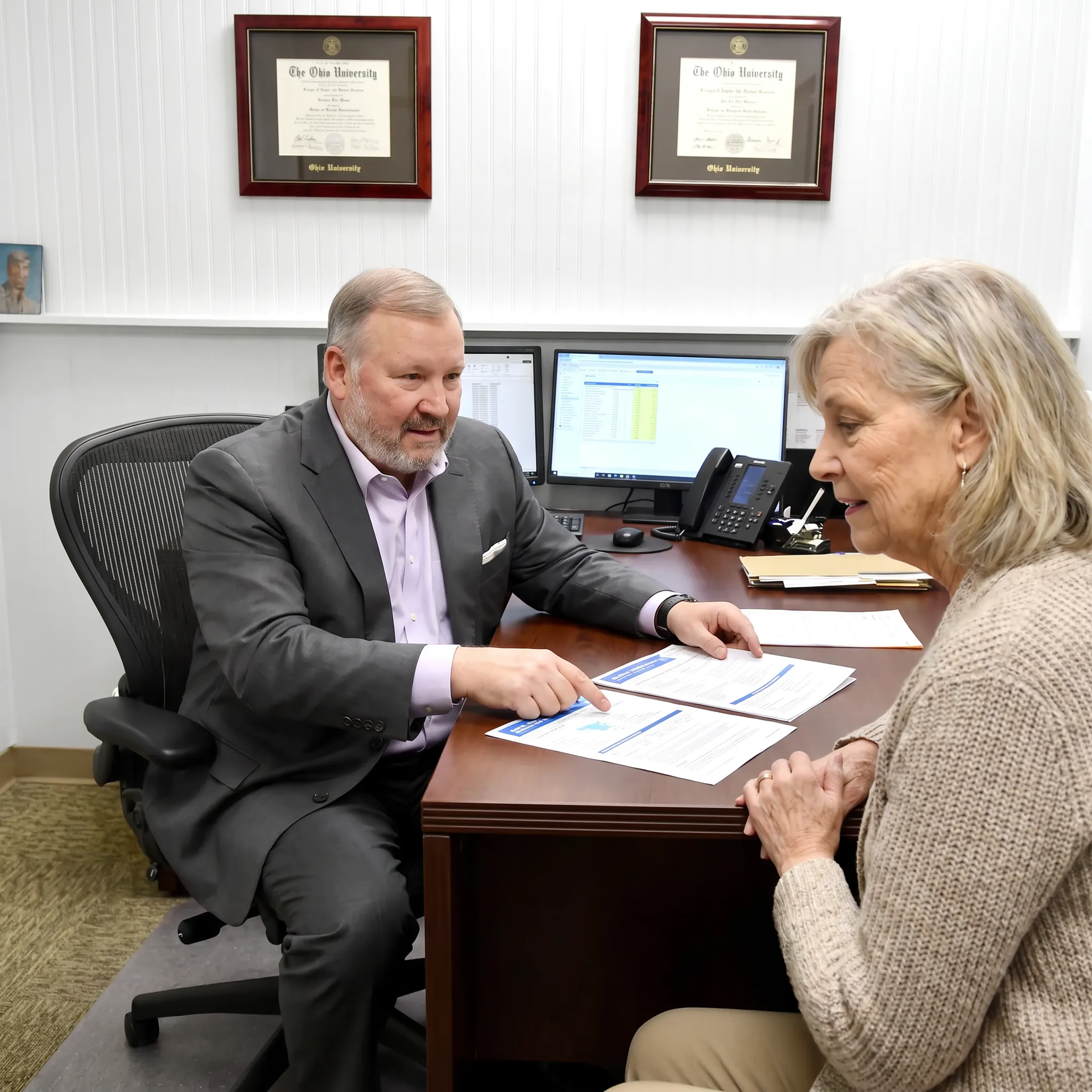 Medicare advisor explaining plan choices to a client