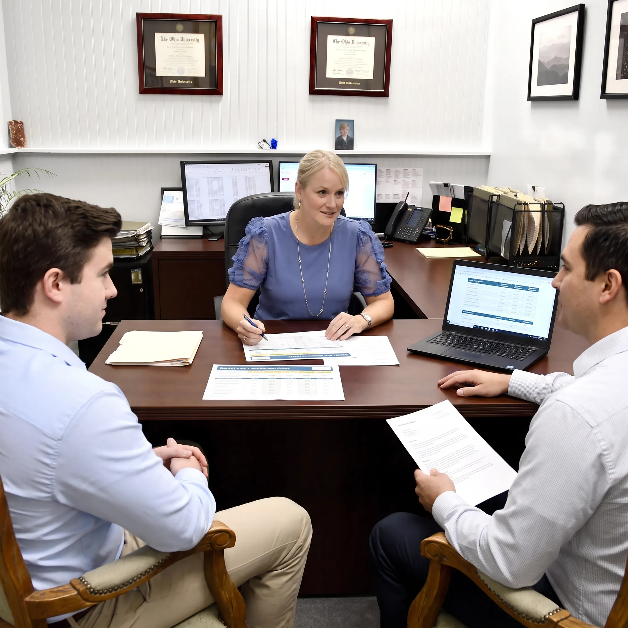 Insurance advisor reviewing dental plan choices